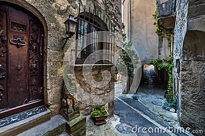 Old carved door and the porch wit Editorial Stock Photo