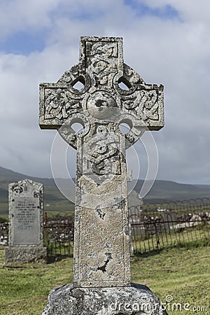 Old carved stone Celtic cross in London cemetery, Stock Photo