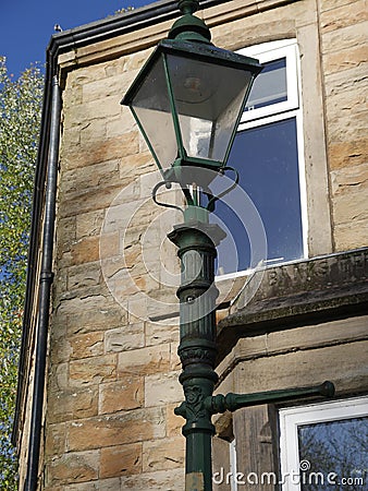 The old cast iron Gas streetlights were converted to electricity in Padiham Stock Photo