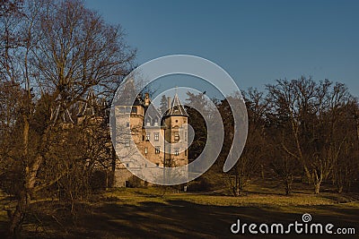 Old castle with a beautiful spring park in Goluchow, Poland. Travel in Europe. Historical monument. Stock Photo