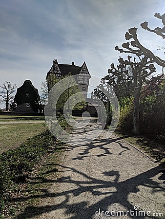 Old castle halftimbered on a village Editorial Stock Photo