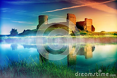 Old castle ruins at sunset Stock Photo