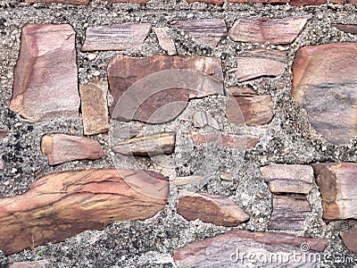 Old castle stone wall as a background or texture. Part of the wall. Stock Photo