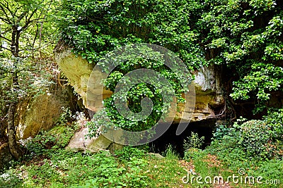 Old caves dug into the tuff rock and used for human habitation in ancient times. Citta del Tufo. Sorano, Sovana, Tuscany, Italy Stock Photo