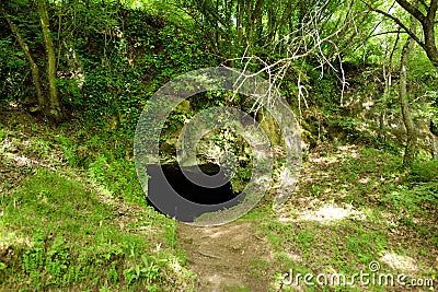 Old caves dug into the tuff rock and used for human habitation in ancient times. Citta del Tufo. Sorano, Sovana, Tuscany, Italy Stock Photo