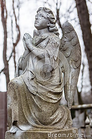 Old cemetery marble sculpture of the angel Stock Photo