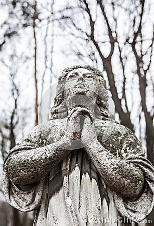 Old cemetery marble sculpture of the angel Stock Photo