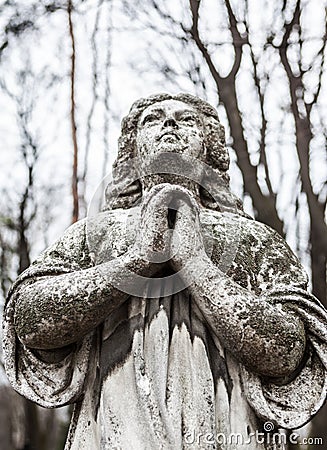 Old cemetery marble sculpture of the angel Stock Photo