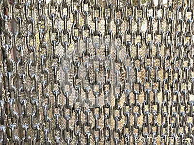 Old chain wall in garden Stock Photo