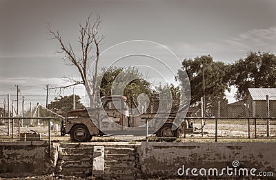 Old Chevy tow truck, parked and left to rust away, filter old image effect Editorial Stock Photo