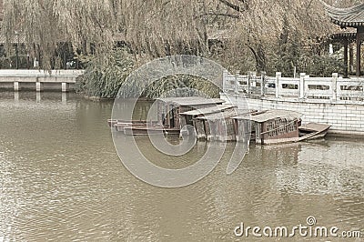 Old chinese sunken boats in the Lotus Pond Stock Photo