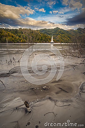 Old church burried under toxic waste from a mining exploitation Stock Photo