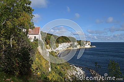 Old church in Hoejerup, tourist attraction at Stevns Klint the chalk cliff on the Danish island Zealand in the Baltic Sea, blue Stock Photo