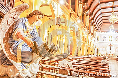 Old church interiors with statue of an angel, Diocese of Chanthaburi, Thailand Editorial Stock Photo