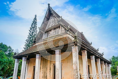 Old church isosceles made of wood on blue sky background Stock Photo