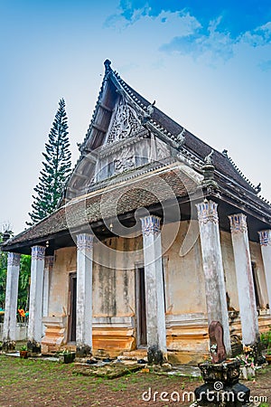 Old church isosceles made of wood on blue sky background Stock Photo