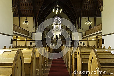 Old church wooden pews Stock Photo