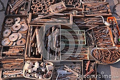 old circles on the saw. close-up showing old rusty metal and brass parts in bulk for decoration Stock Photo