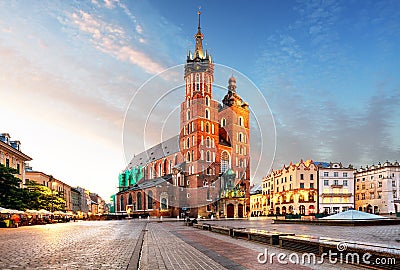 Old city center view with Adam Mickiewicz monument and St. Mary' Stock Photo
