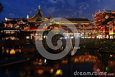 The Old City Gods Temple at night in Shanghai YuYuan Editorial Stock Photo