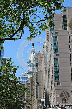 Old city hall tower among modern buildings Editorial Stock Photo