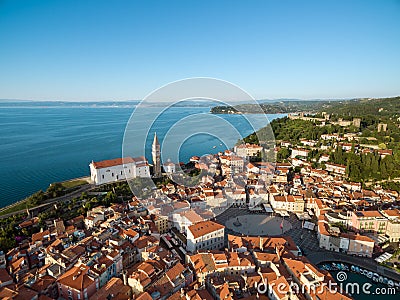 Old city Piran and Tartini Square, bird`s eye view. Aerial photo. Stock Photo