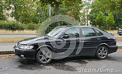 Old classic black Saab 9.3 parked Editorial Stock Photo