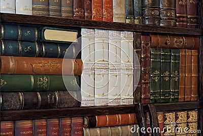 Old classic books on bookshelf Stock Photo