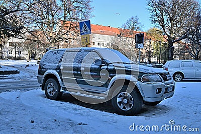 Old classic veteran black offroad big 4wd car Mitsubishi Pajero Sport GL5 parked Editorial Stock Photo