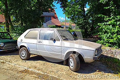 Old vintage dusty light grey VW Golf one parked Editorial Stock Photo