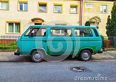 Classic vintage green old van Volkswagen Transporter parked Editorial Stock Photo