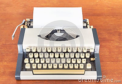 old classic vintage thai typewriter on wooden desk Stock Photo