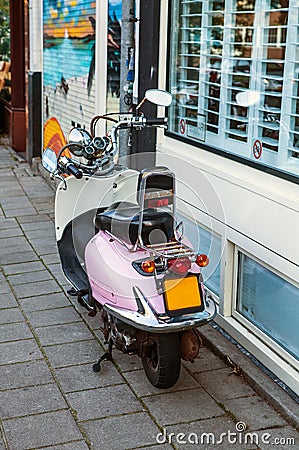 Old classical pink moto bike Amsterdam - Netherlands Editorial Stock Photo