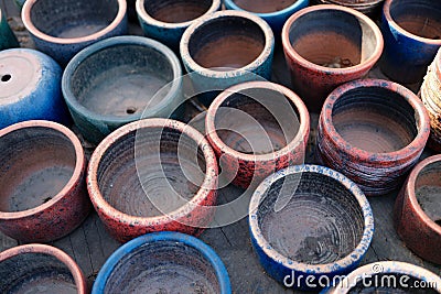 Old clay pots flowerpots closeup. Various used ceramic and clay pots Stock Photo
