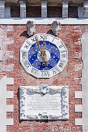 Old clock on the Arsenal building in Venice. Date of construction 1473-1570 Stock Photo