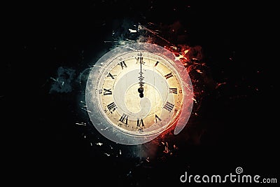 old clock on black background at midnight Stock Photo