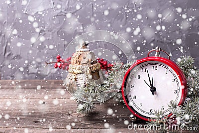 Old clock, decorative owl, berries and branches fur tree on age Stock Photo