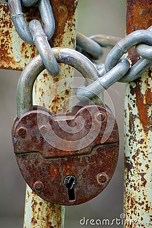 Old closed padlock Stock Photo