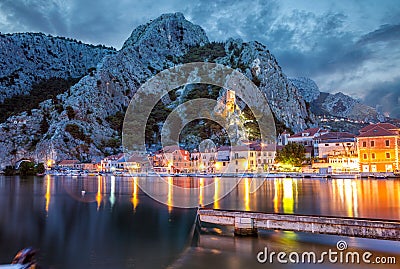 Old coastal town Omis in Croatia at night Stock Photo