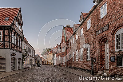 An old cobbled street in the medieval town of Ribe Editorial Stock Photo