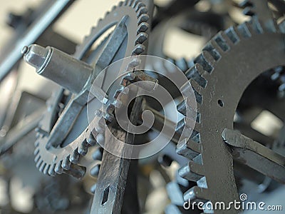 Old cogwheel mechanism from a hour machine. Stock Photo