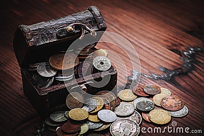 Old coins in chest Editorial Stock Photo