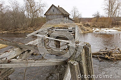 Old collapsed watermills near the river. Stock Photo