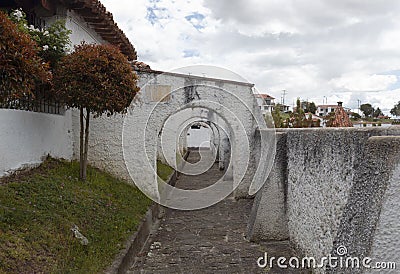 An old colonial arc peatonal street in middle of Guatavita town Editorial Stock Photo