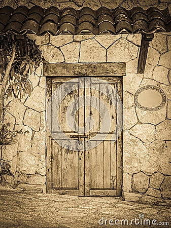 Old colonial doors of mexican hacienda Stock Photo