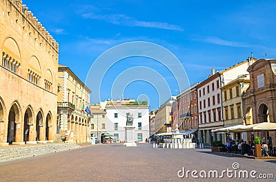 Old colorful multicolored building and houses and Pope Paul V monument on Piazza Cavour square in historical touristic city Rimini Editorial Stock Photo