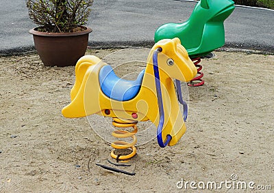 Old colorful seesaw Stock Photo