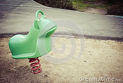 Old colorful seesaw Stock Photo