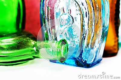 Old colourful bottles against a white background Stock Photo