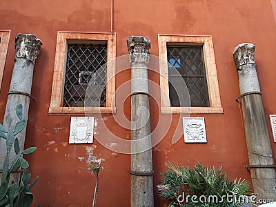 Old columns of an ancient temple to Rome in Italy. Editorial Stock Photo